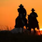 Naplementében lovagoló tehenészek, Mezőgazdasági jog